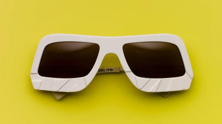 White Sol Sol Ito x Tamy Surrender glasses with a geometric design.