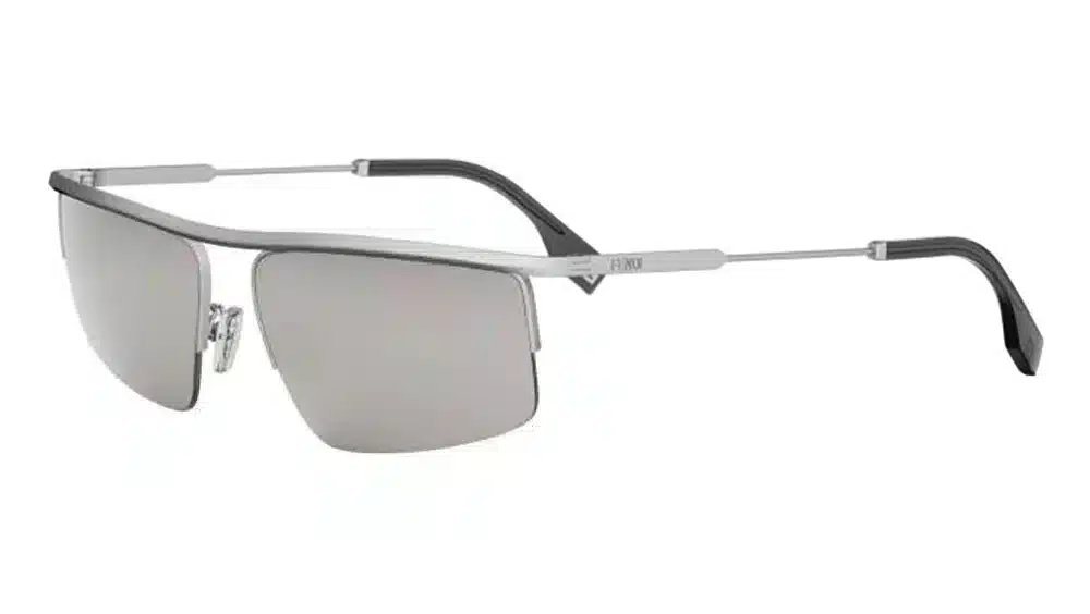 Gafas de sol FENDI TRAVEL FE40141U con montura en metal plateado y diseño semi-al aire. Una construcción sofisticada con una barra metálica distintiva, perfecta para un estilo urbano atrevido.