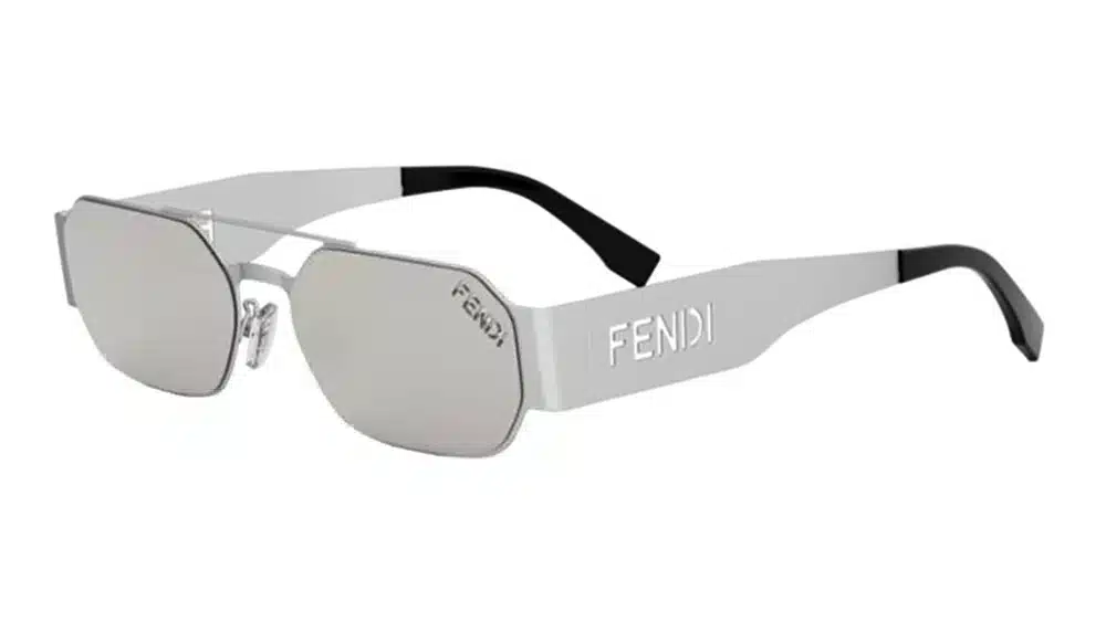 Gafas de sol FENDI CUT OUT FE40153U con montura de metal ligero y varillas decoradas con logotipos recortados. Un modelo futurista con doble puente plano y lentes plateadas, perfecto para un estilo vanguardista.