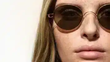Lindberg 2025 gafas minimalistas para mujer con montura dorada y lentes tintadas